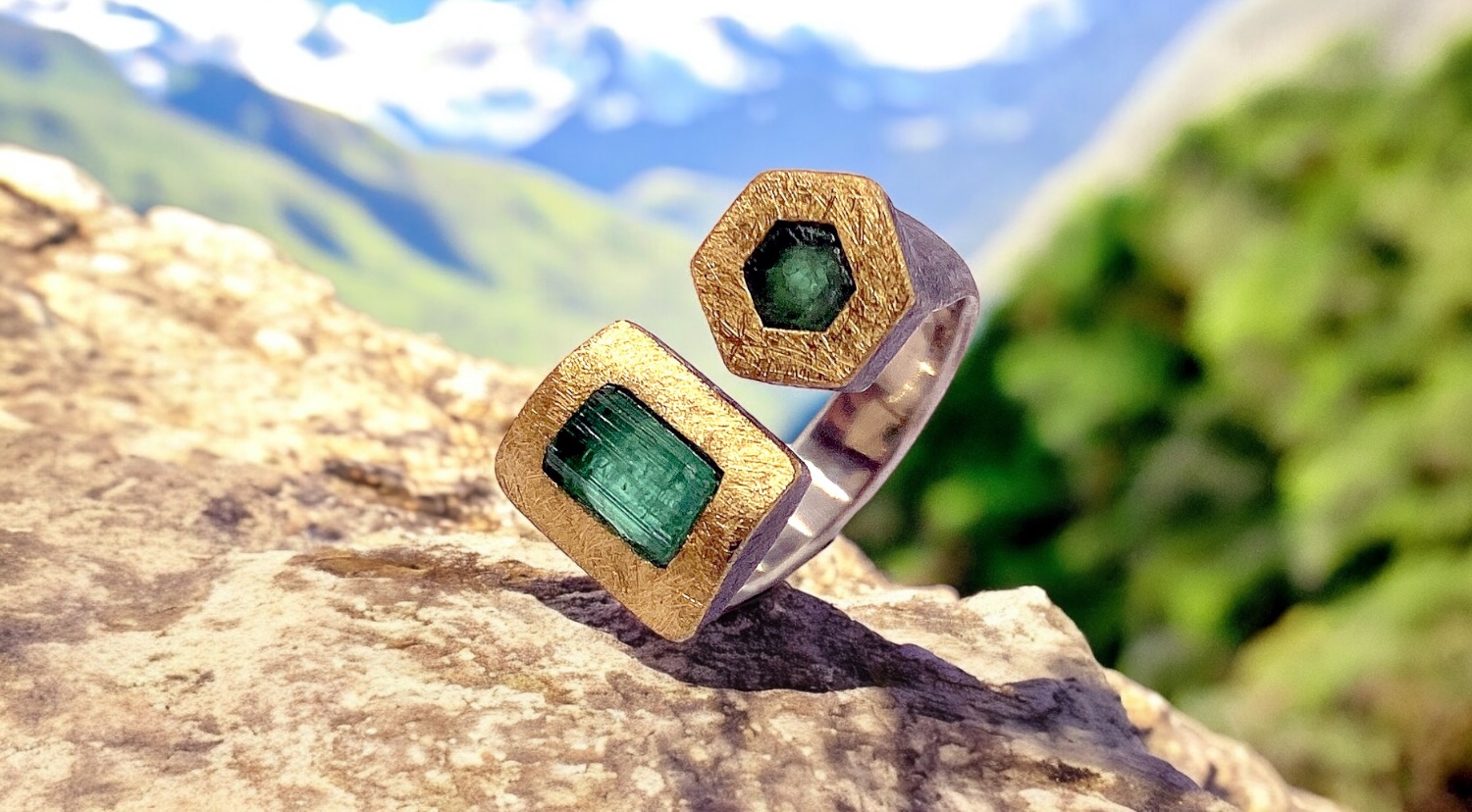 rectangular and hexagonal rough emerald ring in silver and gold