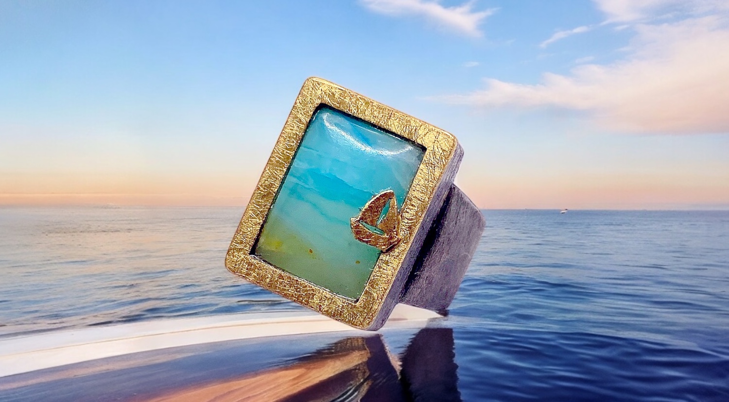 anell opal blau andÍ rectangular vel·ler plata or