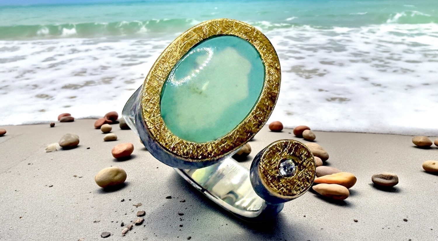 oval peruvian blue opal ring with diamond in silver and gold