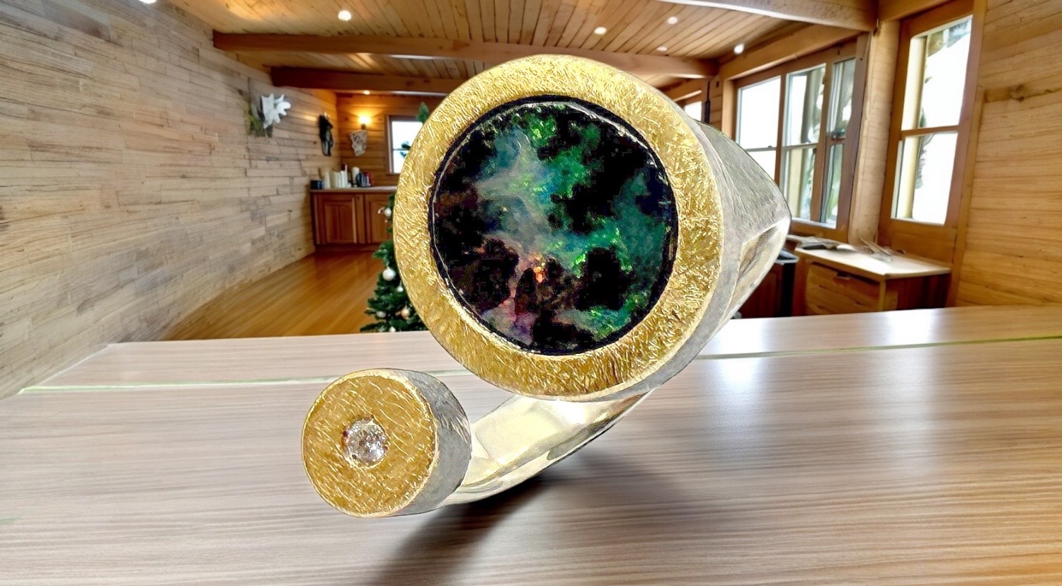 round australian boulder opal ring with diamond in silver and gold