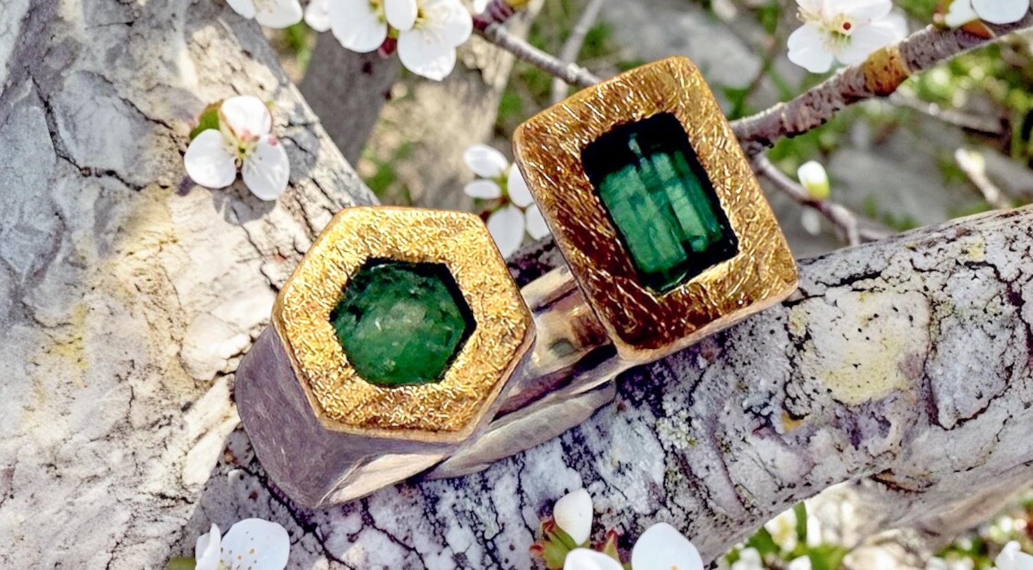 hexagonal and rectangular emeralds ring in silver and gold