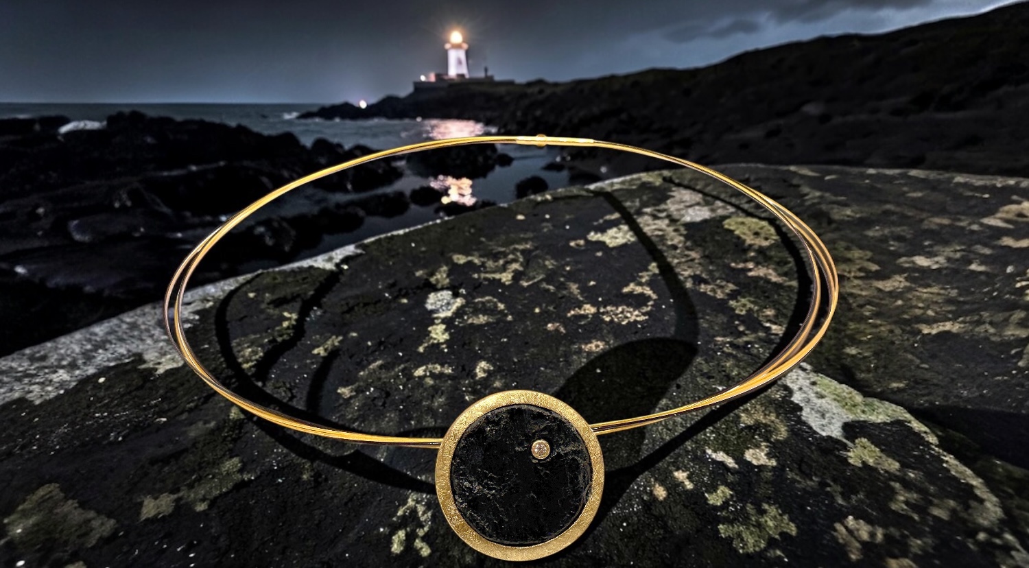 round rough black tourmaline pendant with diamond in silver and gold