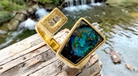 TRAPEZOIDEAL AUSTRALIAN BOULDER OPAL RING WITH 2 DIAMONDS IN GOLD