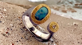OVAL AUSTRALIAN BOULDER OPAL RING WITH DIAMOND IN SILVER AND GOLD